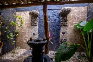 Ein Garten an der Unterkunft Ocho Artisan Bungalows