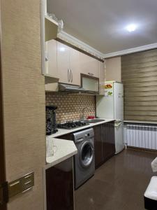 Η κουζίνα ή μικρή κουζίνα στο Ideal apartment for family