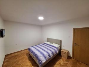 Katil atau katil-katil dalam bilik di Apartman TB