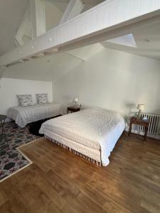 Postel nebo postele na pokoji v ubytování Maison Auctoire + 6 fotografií