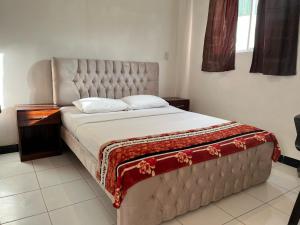 Postel nebo postele na pokoji v ubytování Bahia B&B