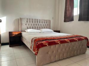 Postel nebo postele na pokoji v ubytování Bahia B&B