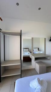 Postel nebo postele na pokoji v ubytování Enelia Apartments