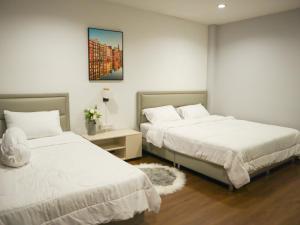 A Little Nap Hometel客房内的一张或多张床位
