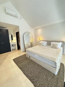 Ένα ή περισσότερα κρεβάτια σε δωμάτιο στο Villa Loft 1 +10 φωτογραφίες