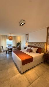 Postel nebo postele na pokoji v ubytování Marina del Faro Resort