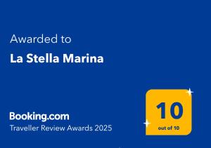 a yellow sign with the text awarded to la steelka marina at La Stella Marina in Bari Sardo