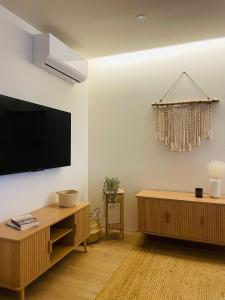 TV a/nebo společenská místnost v ubytování Apartment in Apúlia - Magno House