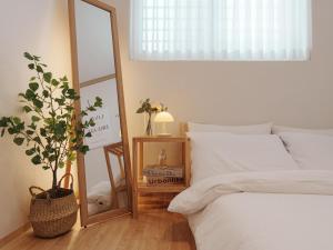 Postel nebo postele na pokoji v ubytování Hue house