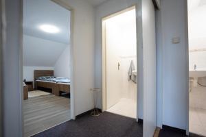Rúm í herbergi á Apartmán Real