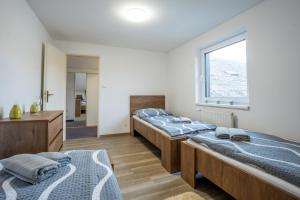 Postel nebo postele na pokoji v ubytování Apartmán Real + 37 fotografií