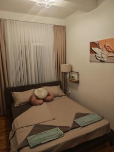 Postel nebo postele na pokoji v ubytování Apartman Golden Crown