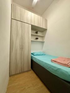 Postel nebo postele na pokoji v ubytování Manhattan Suites ITCC by KinabaluKomfortHomestay - Iverie