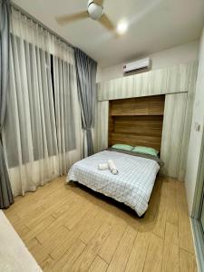 Postel nebo postele na pokoji v ubytování Manhattan Suites ITCC by KinabaluKomfortHomestay - Iverie
