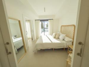 Posteľ alebo postele v izbe v ubytovaní Pent-House on the Golden Mile