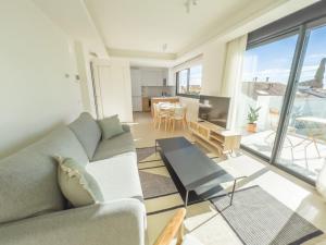 Posedenie v ubytovaní Pent-House on the Golden Mile