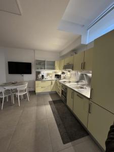 Kuchyň nebo kuchyňský kout v ubytování Firrao Rooms Matera