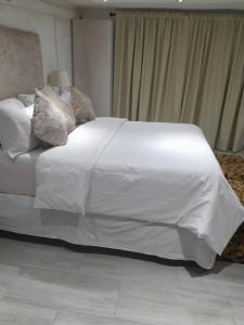 Postel nebo postele na pokoji v ubytování Green Earth