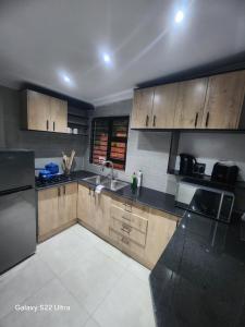 Kuchyň nebo kuchyňský kout v ubytování Green Earth