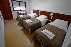 Postel nebo postele na pokoji v ubytování Trinidad Inn Trinidad