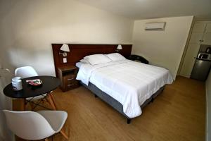 Postel nebo postele na pokoji v ubytování Trinidad Inn Trinidad