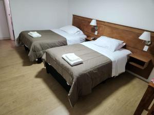 Postel nebo postele na pokoji v ubytování Trinidad Inn Trinidad