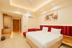 Voodi või voodid majutusasutuse Celestial Suites toas