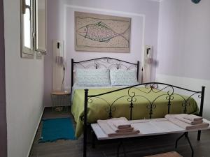 Postel nebo postele na pokoji v ubytování La casa di Aneupe