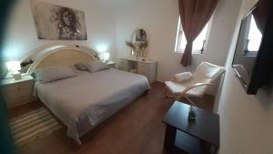 Posteľ alebo postele v izbe v ubytovaní apartmani G&M