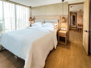 Giường trong phòng chung tại Faranda Collection Cúcuta +12 ảnh