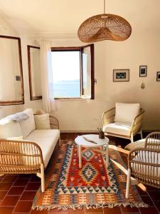 Χώρος καθιστικού στο Villa vista mare a Bosa