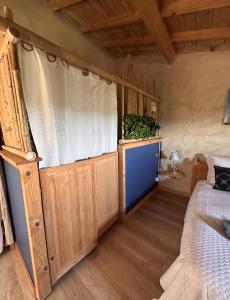a bedroom with a bed and a window at Le Patio Tursan in Pimbo +12 photos