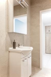 Koupelna v ubytování Loft Fabryka Włókna 3c #nestapartamenty + 8 fotografií