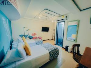 Viajero Cartagena - Getsemaní Hostel客房内的一张或多张床位
