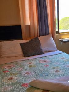Postel nebo postele na pokoji v ubytování Hotel Pacheco