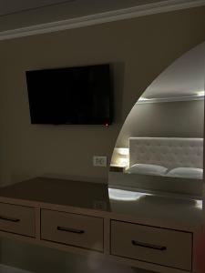 Postel nebo postele na pokoji v ubytování Bliss Boutique Hotel