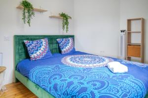 Ένα ή περισσότερα κρεβάτια σε δωμάτιο στο Appartement très lumineux - vue sur la ville - 4 personnes