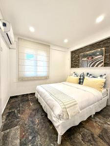 Ένα ή περισσότερα κρεβάτια σε δωμάτιο στο Luxury apartment in center Cascais