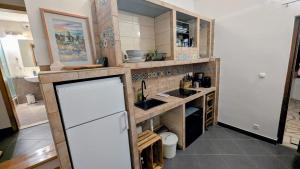 Kuchyň nebo kuchyňský kout v ubytování Paradies Apartments Prizba