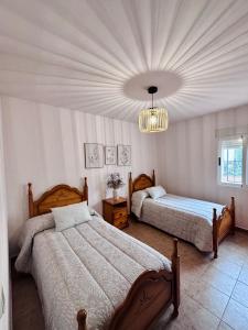 Ένα ή περισσότερα κρεβάτια σε δωμάτιο στο La Casita del Ojuelo