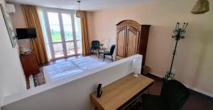 Postel nebo postele na pokoji v ubytování La Kascina Suite & Rooms