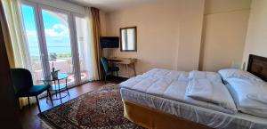 Postel nebo postele na pokoji v ubytování La Kascina Suite & Rooms