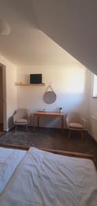 Voodi või voodid majutusasutuse Penzion Apartmány Libošovice toas