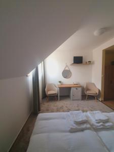 Voodi või voodid majutusasutuse Penzion Apartmány Libošovice toas