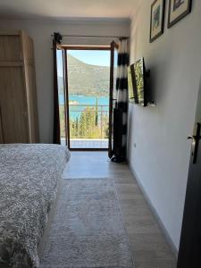 Postel nebo postele na pokoji v ubytování Apartman I&M