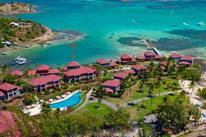 an aerial view of a resort near the ocean at Villa Les Agaves front de mer in Le François