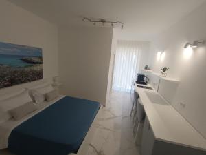 Postel nebo postele na pokoji v ubytování La casa di mest Pepp