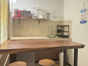 Kuchyň nebo kuchyňský kout v ubytování BACALAR INN Hotel