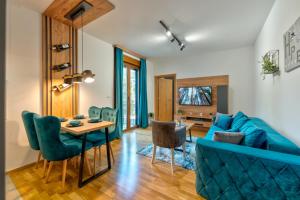 A television and/or entertainment centre at Vila Zlatibor SPA & Wellness