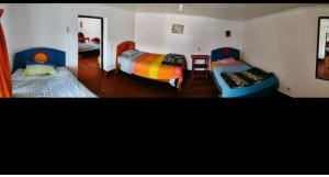 Voodi või voodid majutusasutuse Hostel Rivendell Cusco toas